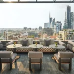 Outdoor terrace at STK Milan overlooking the Milan skyline