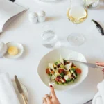 Elegant breakfast table with dishes and drinks at The Peninsula Paris