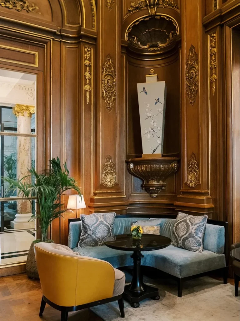 Elegant lounge seating and ornate interiors at The Peninsula Paris