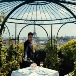 Outdoor dining table with Eiffel Tower views at The Peninsula Paris