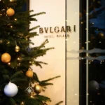 Festive Christmas tree and elegant seasonal decorations displayed inside Bulgari Hotel Milano