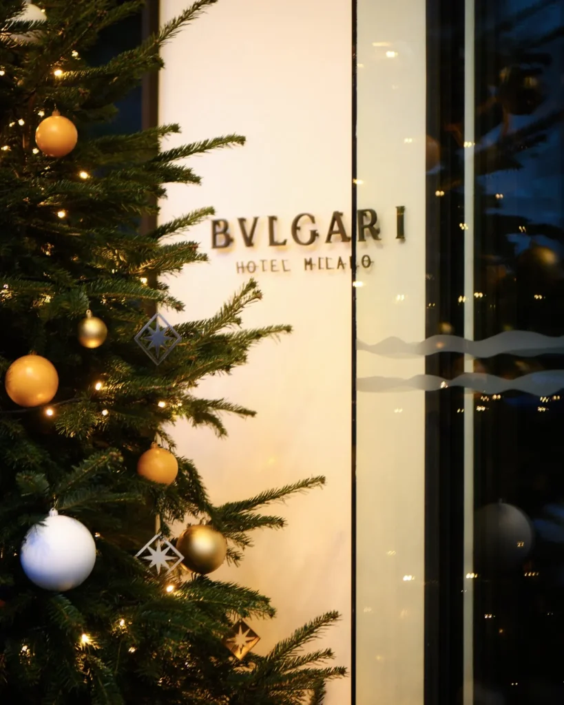 Festive Christmas tree and elegant seasonal decorations displayed inside Bulgari Hotel Milano