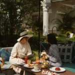 Outdoor dining experience in the leafy courtyard garden at Four Seasons Hotel Milano