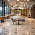 Sophisticated restaurant interior with symmetrical dining tables, contemporary lighting and floor-to-ceiling windows at Four Seasons Hotel Milano