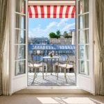 Sunlit Parisian balcony with a view from Le Bristol Paris