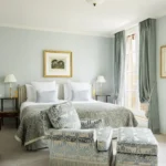 Elegant bedroom with classic French decor at Le Bristol Paris