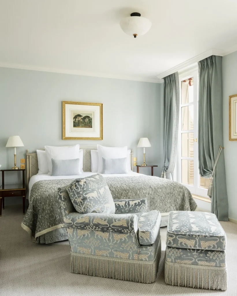 Elegant bedroom with classic French decor at Le Bristol Paris