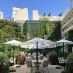 Beautiful outdoor garden terrace at Le Bristol Paris