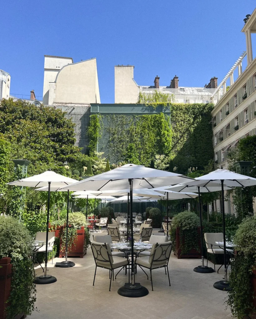 Beautiful outdoor garden terrace at Le Bristol Paris