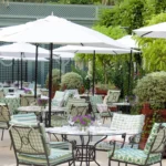 Outdoor garden dining area at Le Bristol Paris