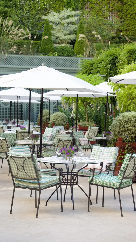 Outdoor garden dining area at Le Bristol Paris