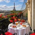 Breakfast on a Paris balcony overlooking the Eiffel Tower