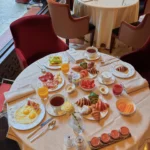 Gourmet breakfast spread served at Le Meurice Paris