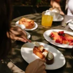 Fine dining experience featuring elegantly plated seafood, desserts and drinks at Mandarin Oriental Milan