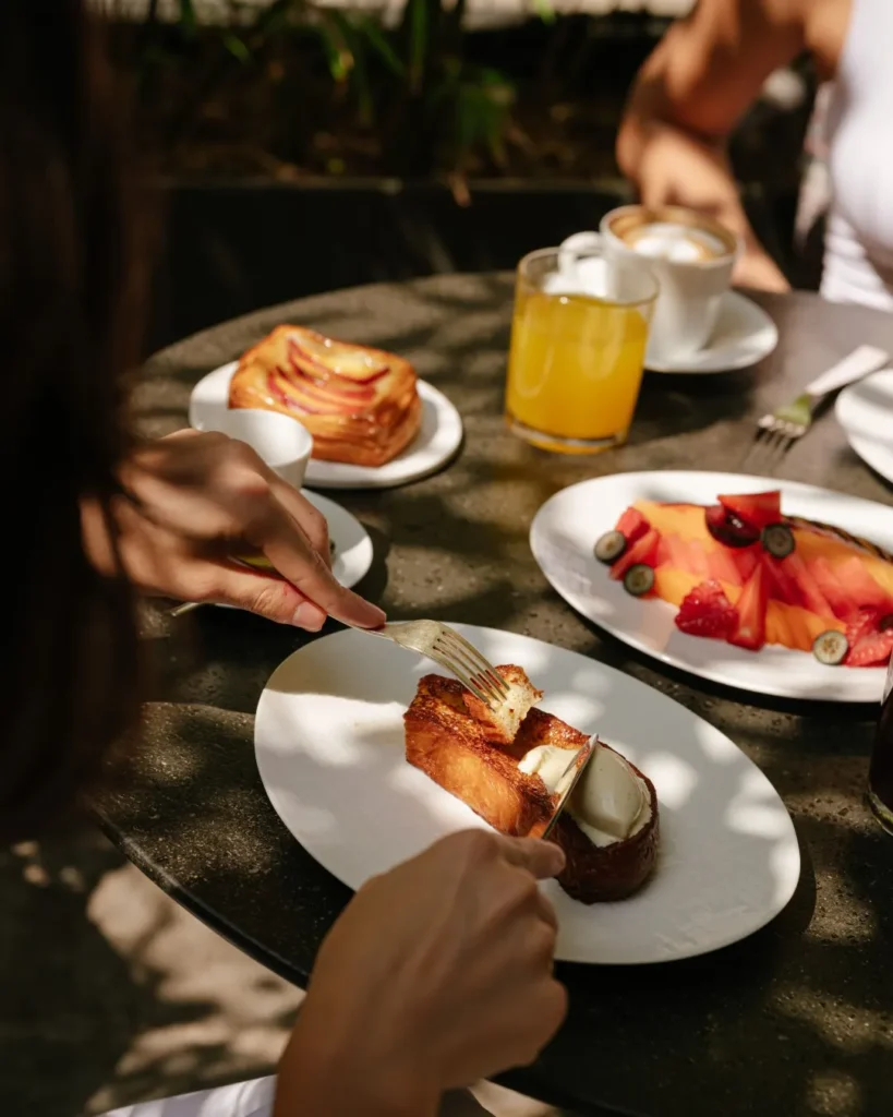 Fine dining experience featuring elegantly plated seafood, desserts and drinks at Mandarin Oriental Milan