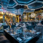 Contemporary restaurant interior with blue accent lighting, geometric ceiling details and elegant dining tables at Philipp's Club Milano