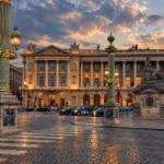 Place de la Concorde in Paris at golden hour with historic architecture and ornate street lamps