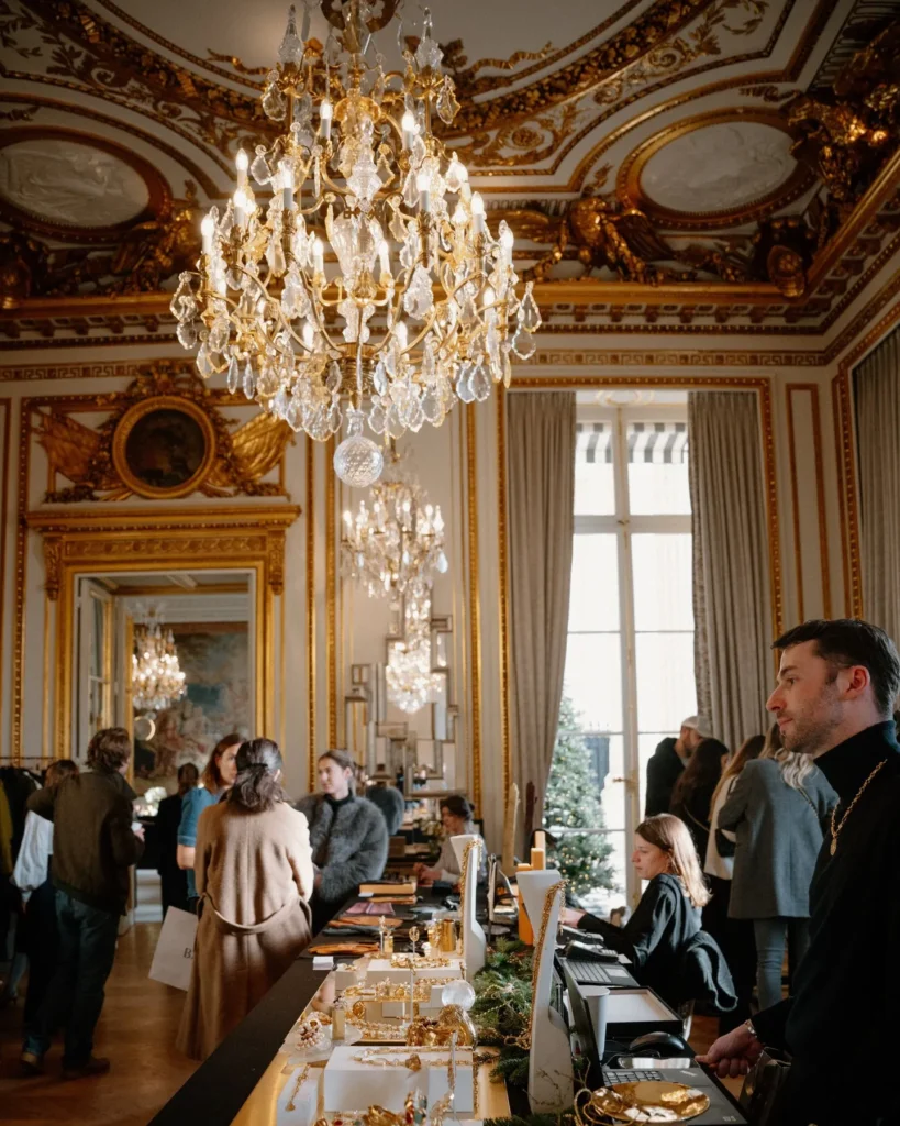 Ornate grand salon with crystal chandeliers, gilded details and elegant seating at Rosewood Hôtel de Crillon Paris