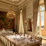 Refined private dining room with chandeliers, elegant table settings and classic interiors at Rosewood Hôtel de Crillon Paris